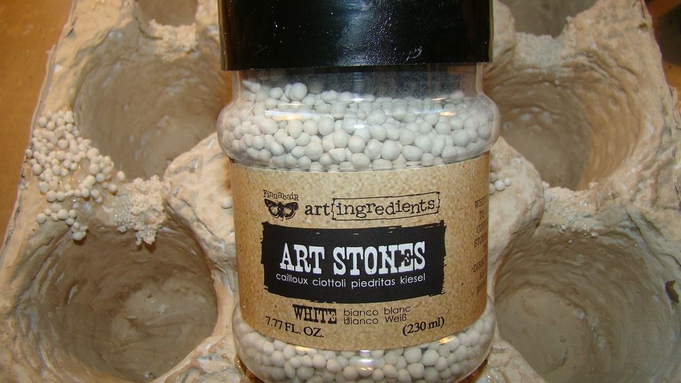 Let's prepare the surface with some yummy texture. Using Matt Gel Medium I adhered mini and regular art stone here and there. Dry completely.