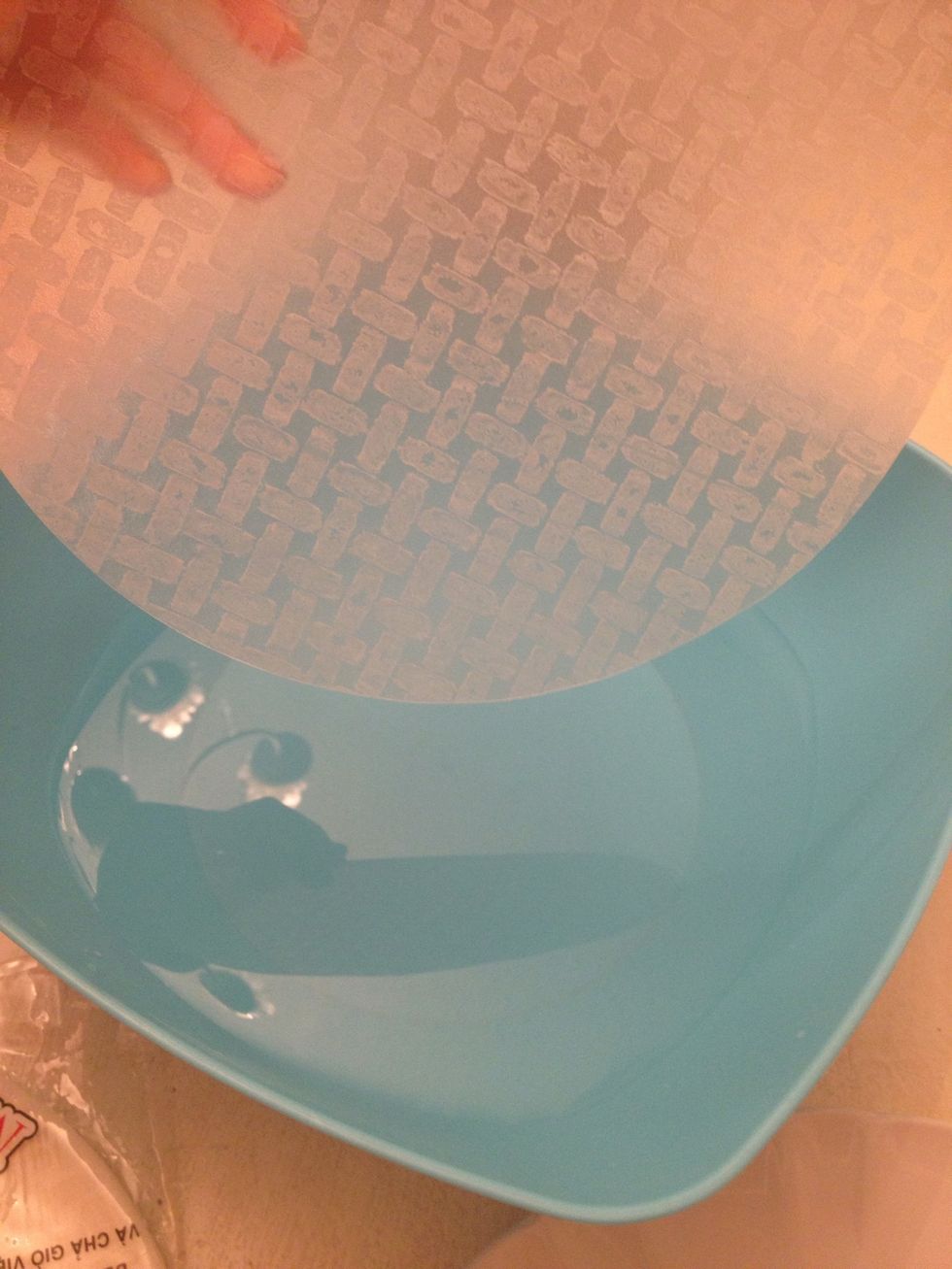 Let's Roll!!! Get a large bowl and fill with warm water. Dip your paper in and turn all the way around so it's all wet. And quickly transfer to plate. It gets soft quick.