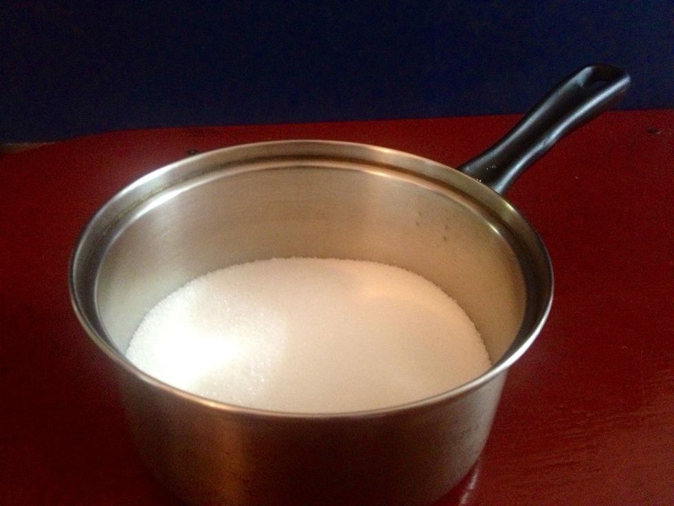 Let's start with preparing the caramel. Put sugar into a small saucepan.