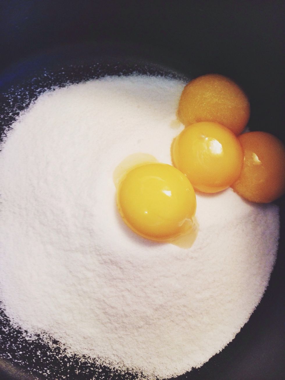 Let's start with the filling: Whisk the sugar, salt and egg yolks in a large saucepan until combined.