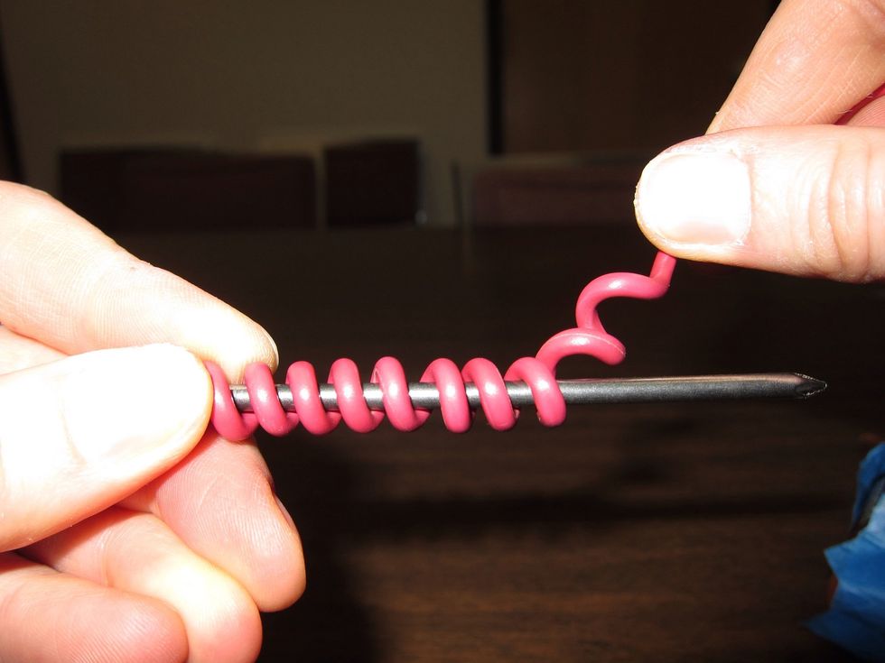 Let's try fewer coils. We'll unwrap some wire.