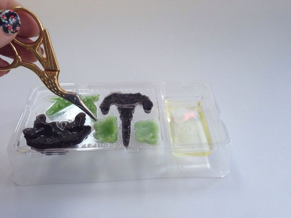 Let sit for about 5 minutes and use provided fork or something sharp to loosen edges