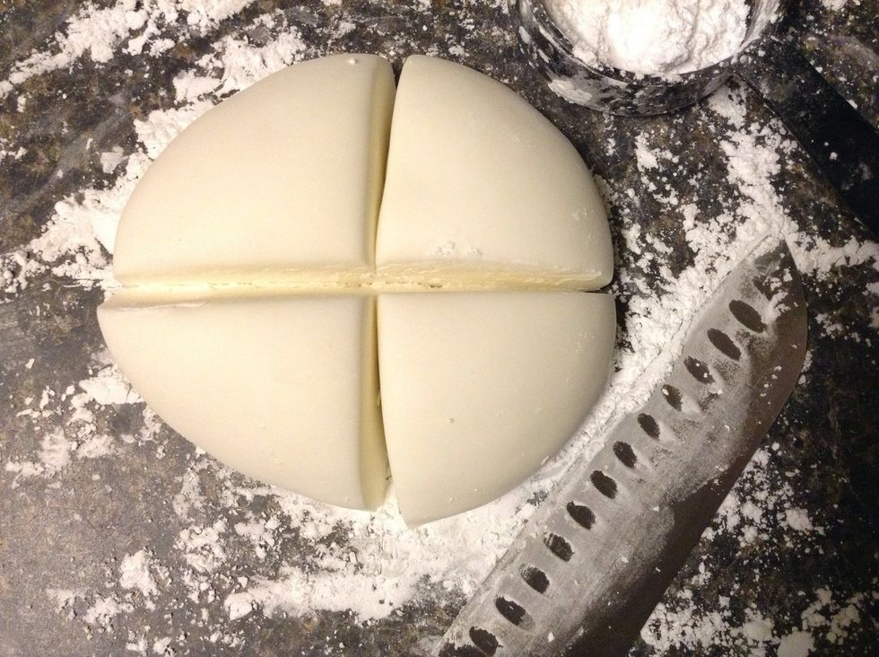 Let sit for about five minutes and then cut with a powdered sugar dusted knife into sections. This is not necessary unless you plan on coloring the fondant.