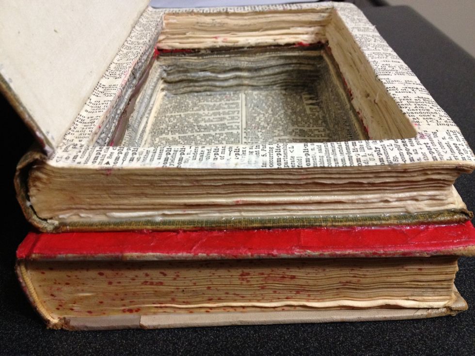 Let sit until dry using a weight on top to hold the pages in place, allowing them to properly stock together. Re-apply glue if needed.