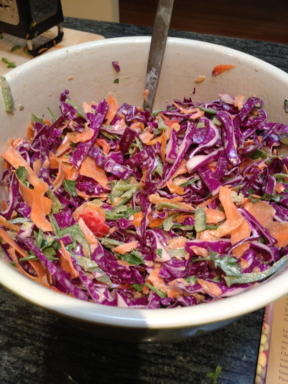 Let stand a bit, about 15 minutes, before serving. Don't let stand for more then a day, or the vibrant purple of the cabbage will bleed out.