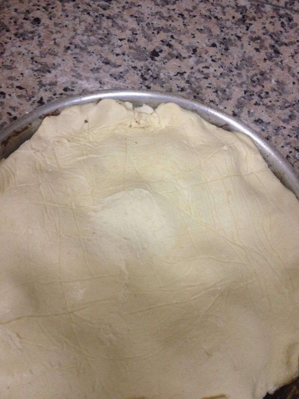 Let the apples cool slightly then cover with puff pastry... Tuck the edges inside the pan