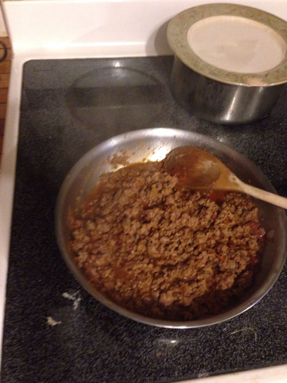 Let the beef and seasoning simmer for about 10 minutes on low heat.