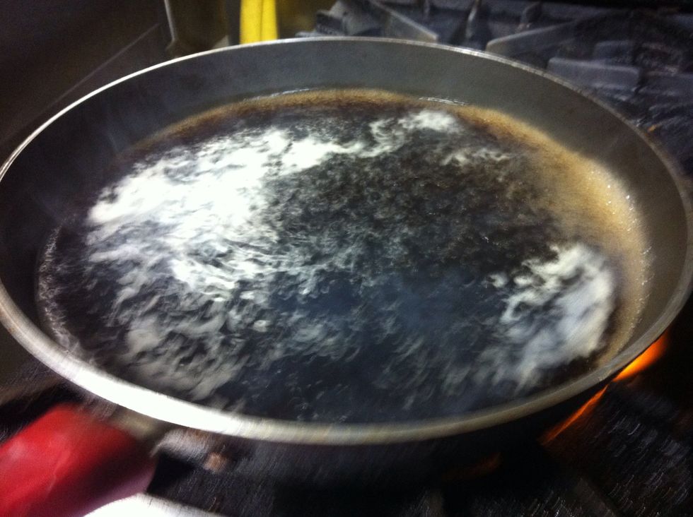 Let the beef stock simmer before starting the risotto.