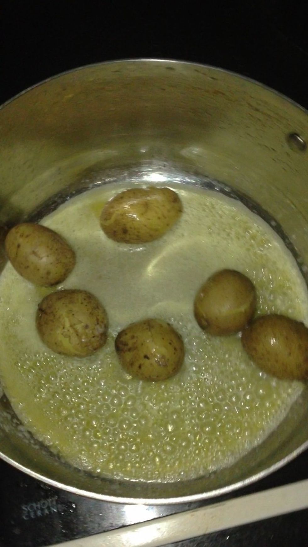 Let the butter melt and stir around being gentle not to break the potatoes