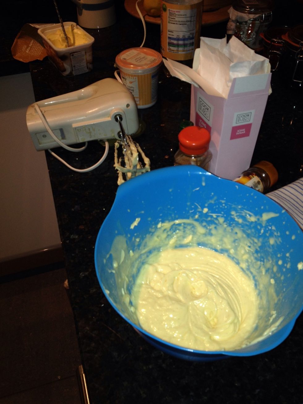 Let the butter soften and come up to room temp. Mix with electric mixer.