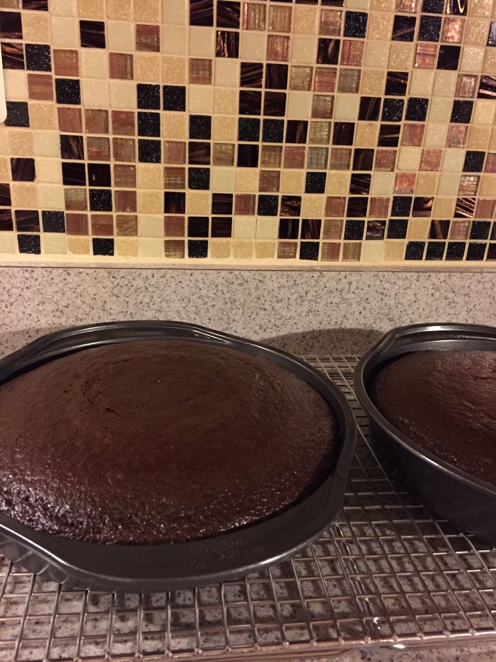 Let the cake cool for 45 minutes to an hour. While the cake is cooling, in a small microwaveable dish add the semi- sweet chocolate and butter.