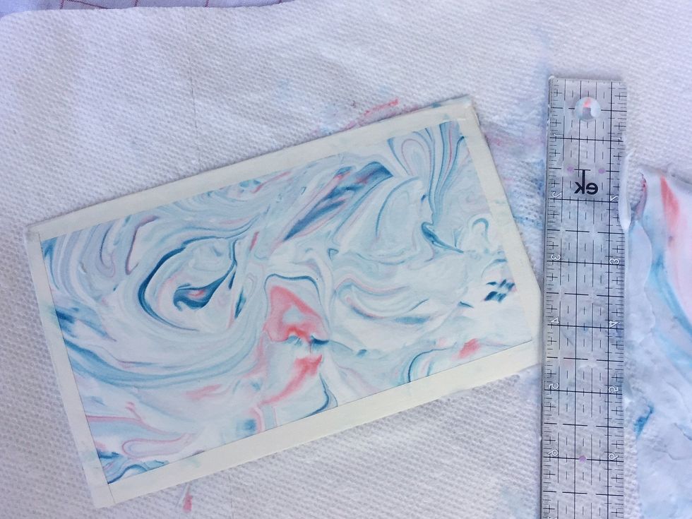 Let the card dry and flatten under a heavy object