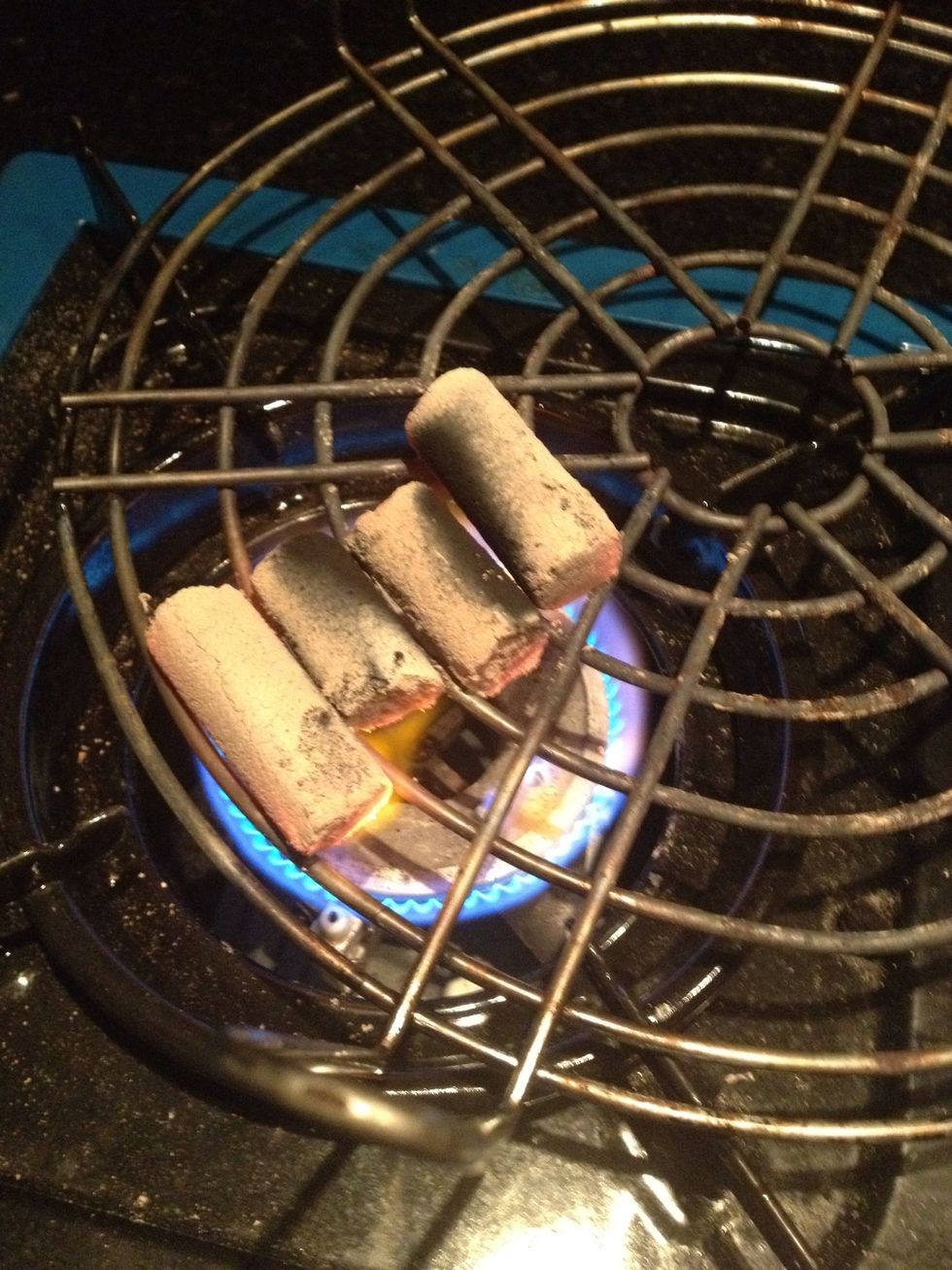 Let the coals get red on all sides by turning it