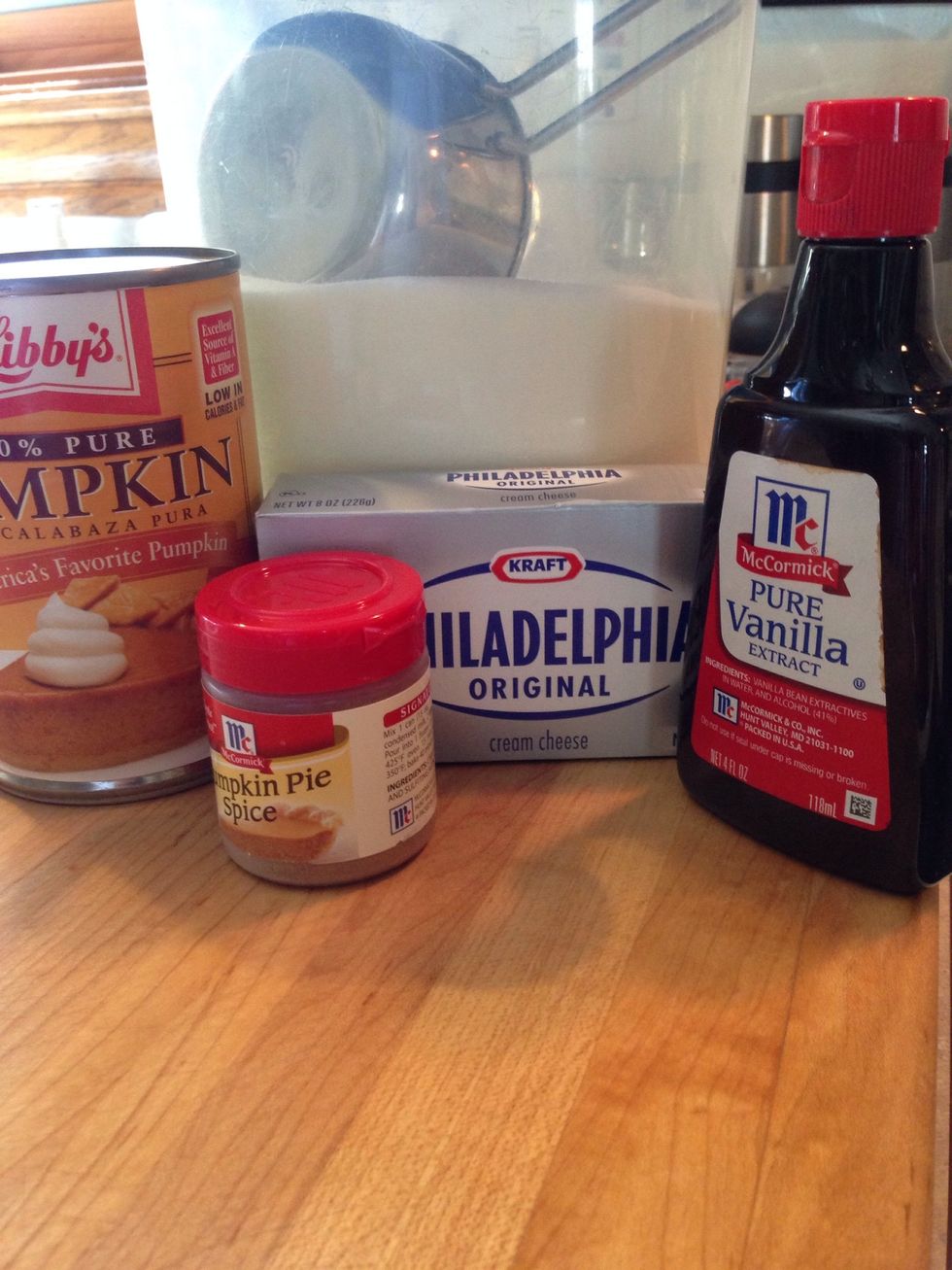 Let the cream cheese sit out at room temperature to warm up. Microwaving to warm it seems to thin the consistency of the finished product.