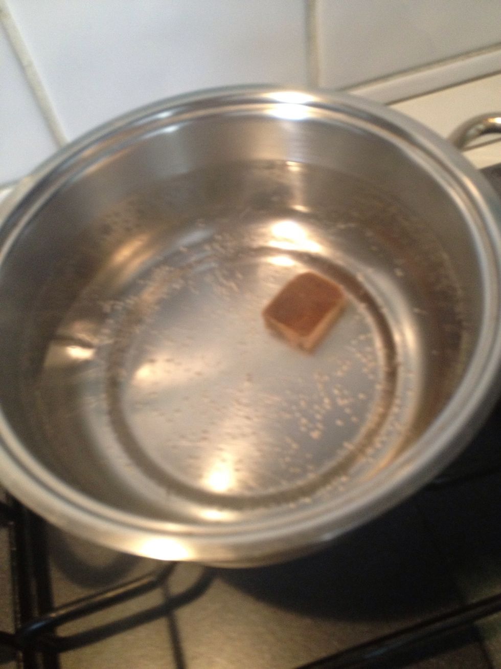 Let the cube dissolve itself in the water