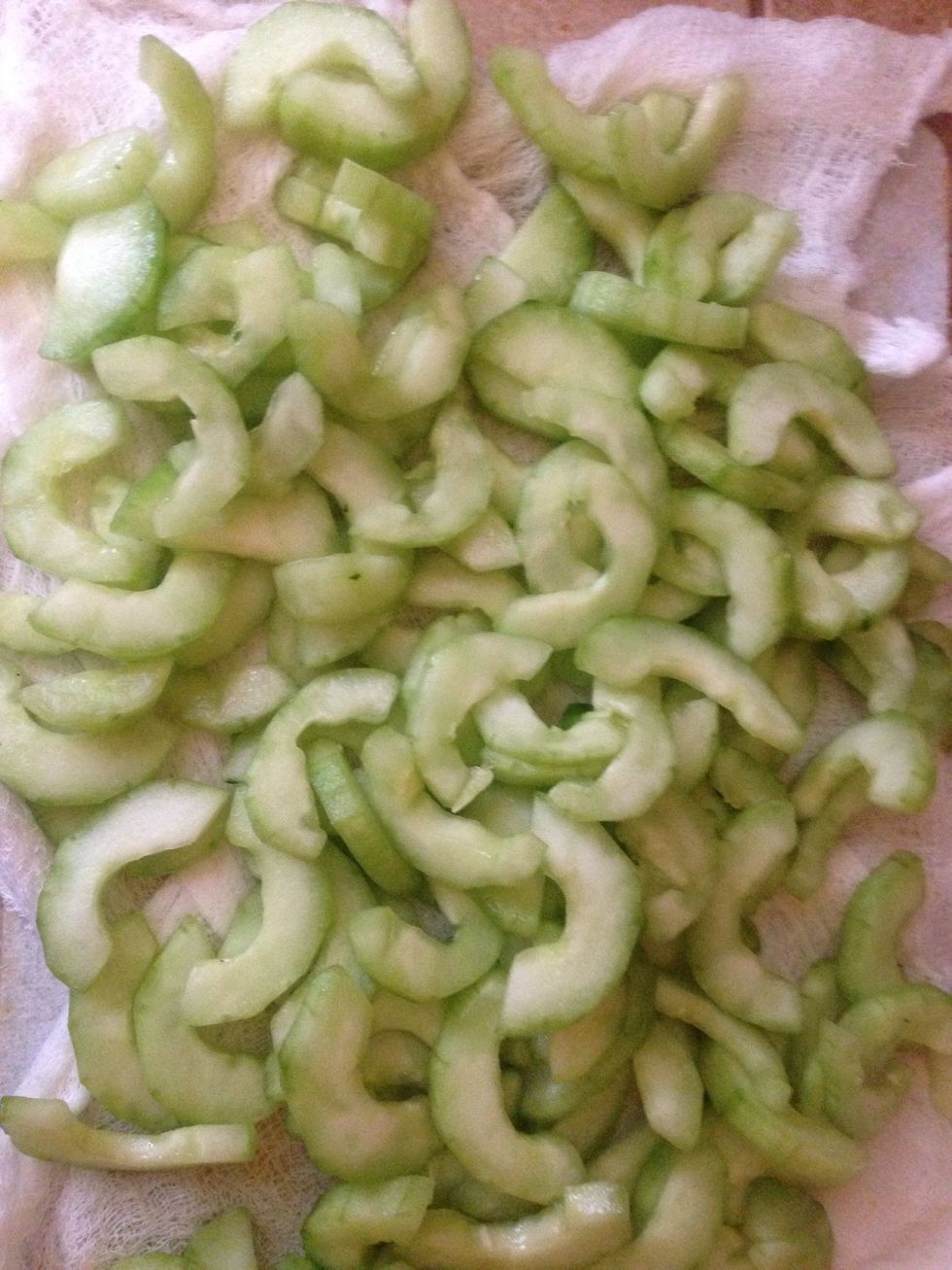Let the cucumbers sit on the cheesecloth for 30 minutes.