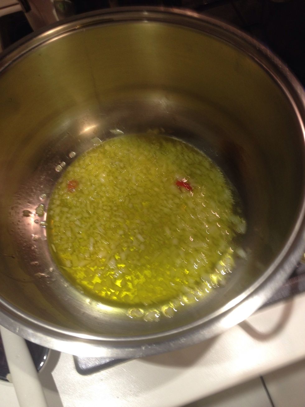 Let the oil and onion fry a little bit after the onion have been cut in little pieces! Add some chili if you want