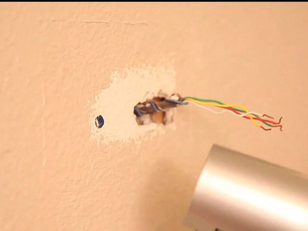 Let the paint dry before mounting the new thermostat.