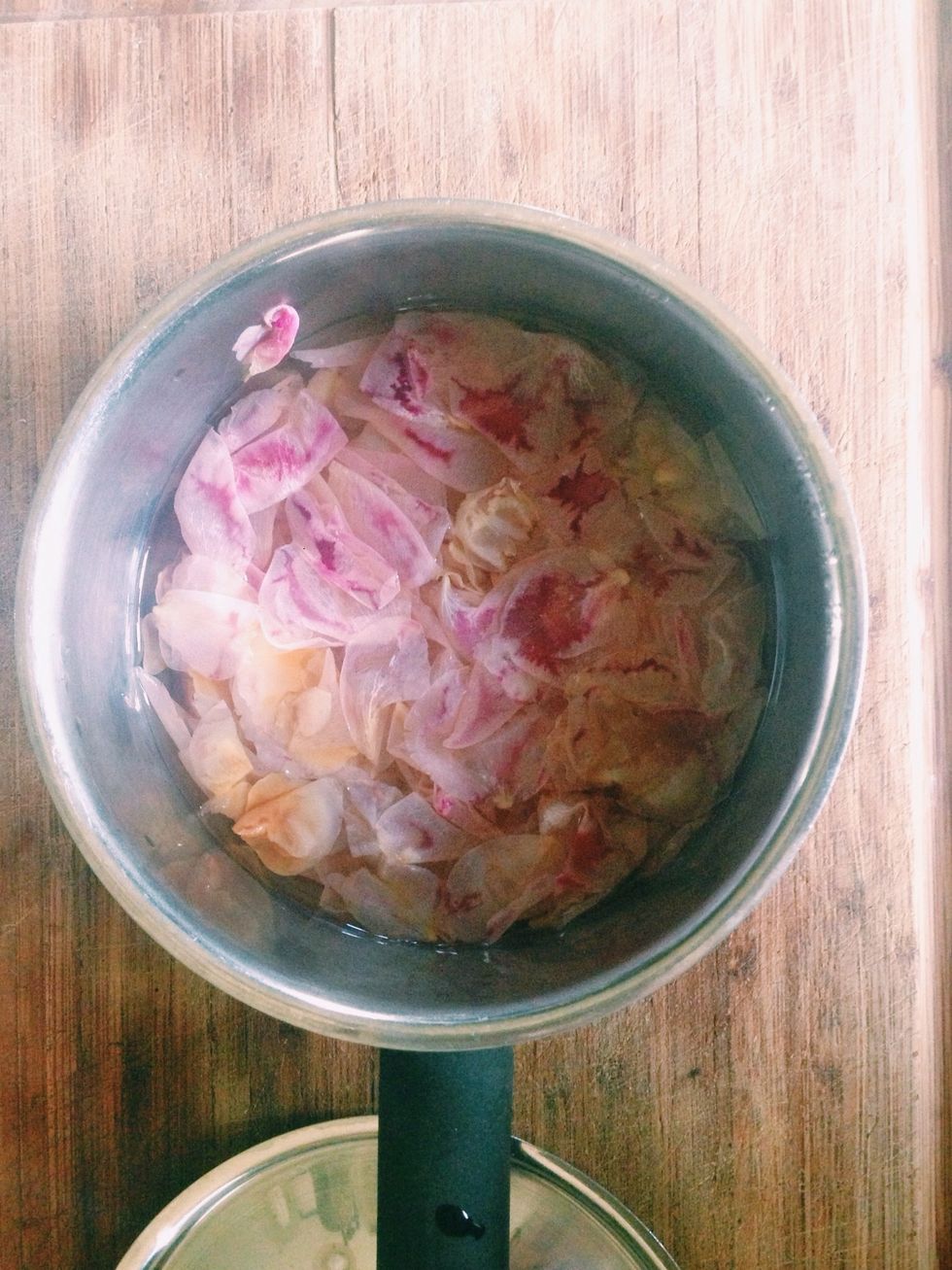 Let the petals simmer (with a lid on) on the lowest stove setting until the colour has leached out entirely - this process took around 15 minutes for me, but be sure to check them often.