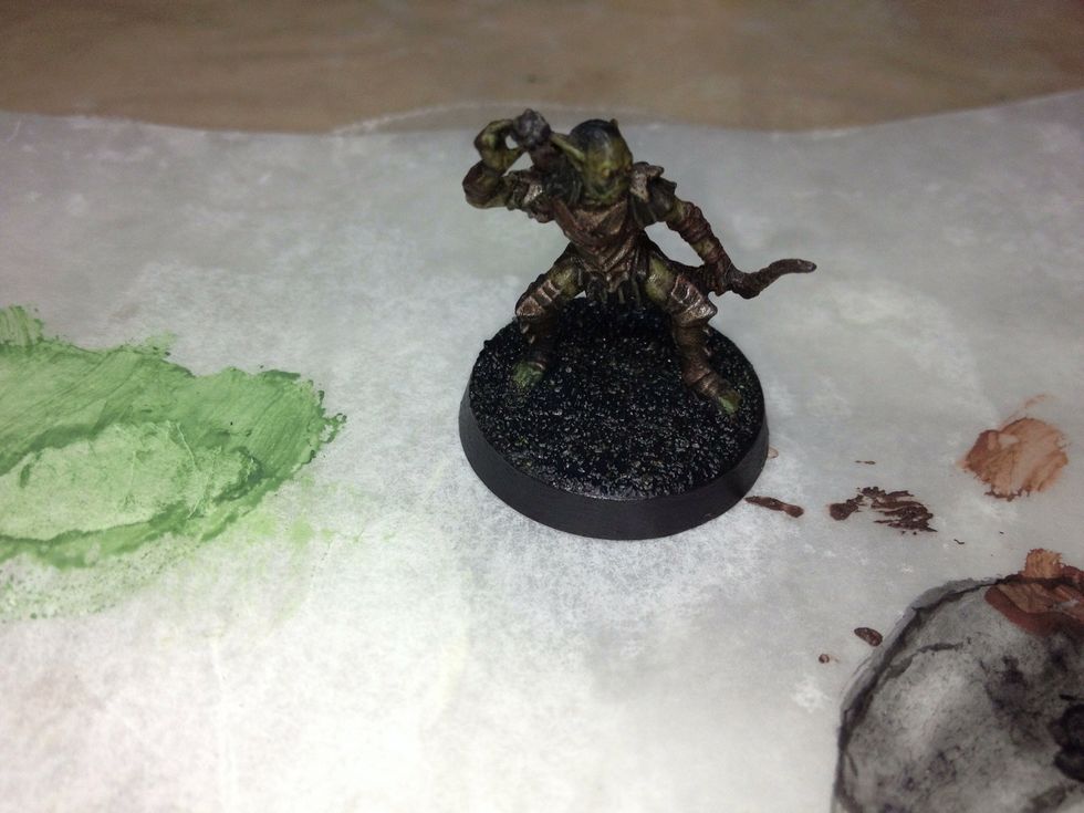 Let the primer dry for at least four hours, if not overnight. Once that's done, the sand can be painted.