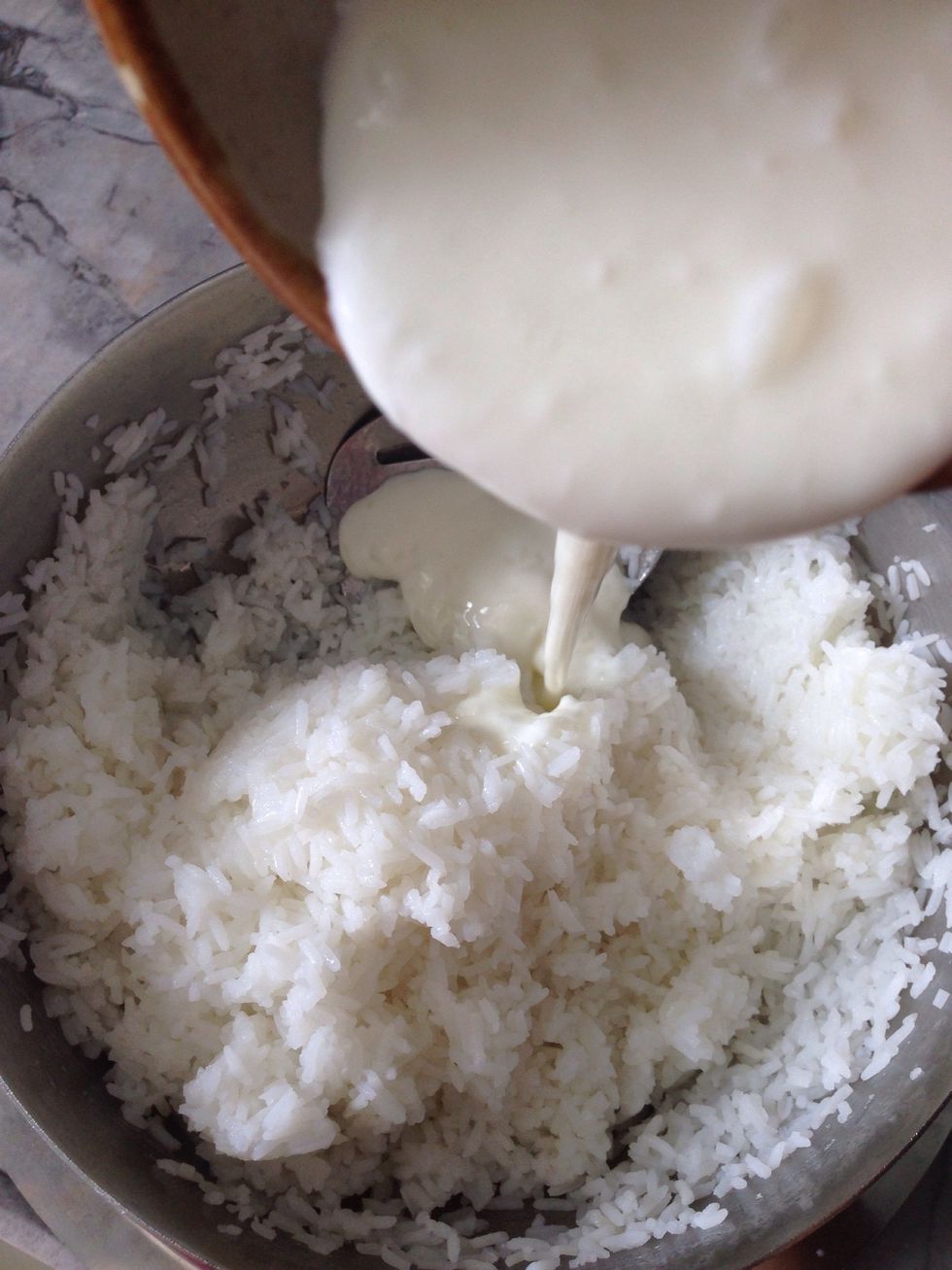 Let the rice cool down and add beaten curd.. After mixing curd rice if it tastes sour, u can add some milk..