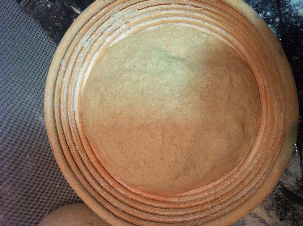 Let the round rest a minute and then place it in the basket, top side down
