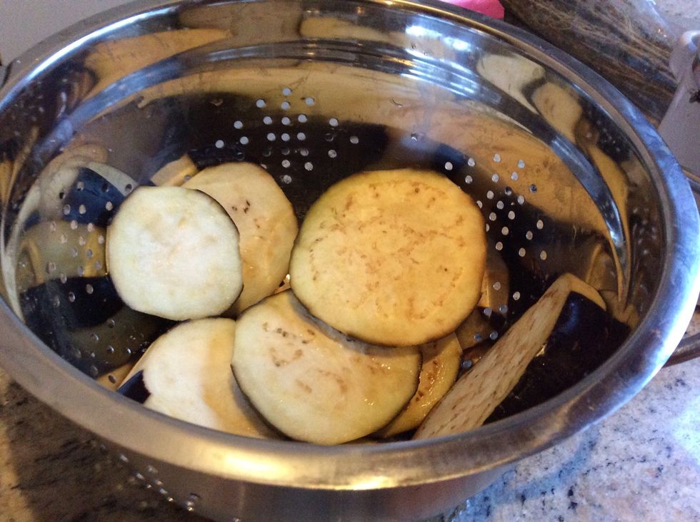 Let the sliced eggplant salt to get rid of the bitter juices.