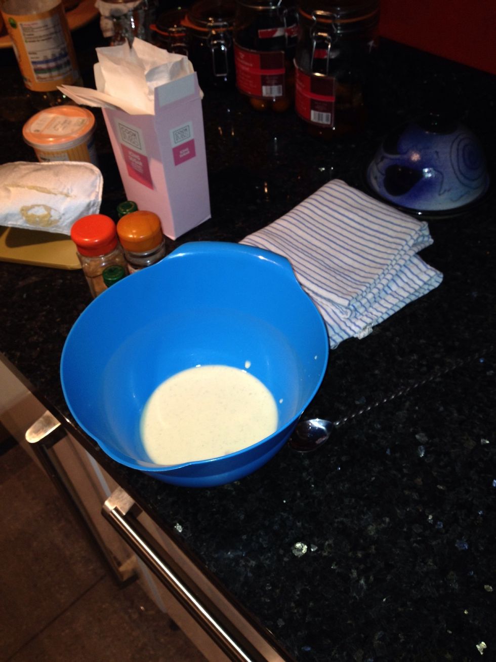 Let the vanilla ice cream melt and get to room temp and pour into mixing bowl.