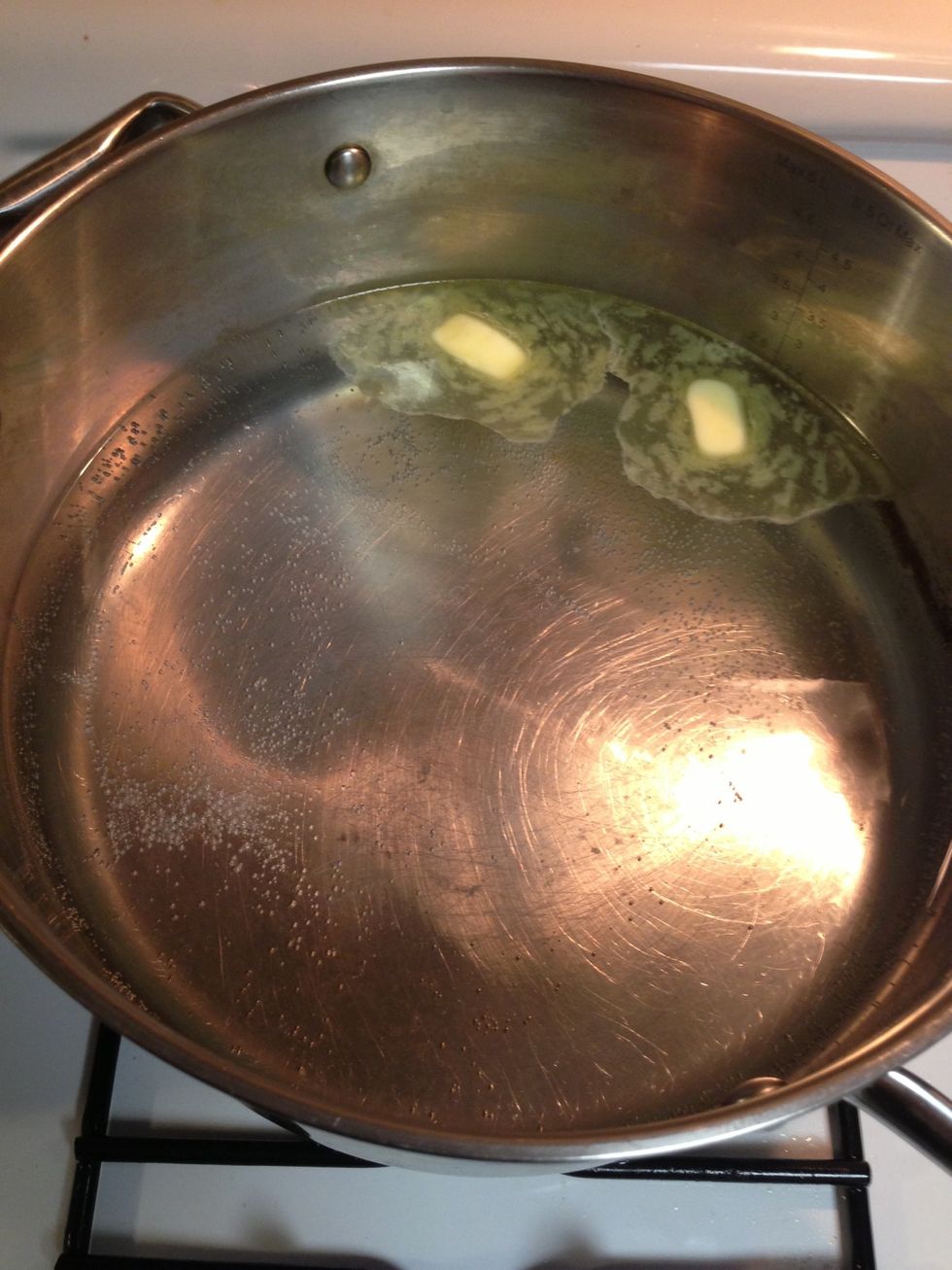 Let the water boil with butter
