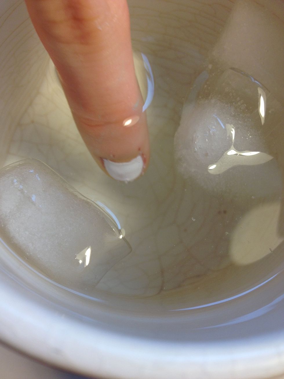 Let the white harden by keeping your finger in an ice bath.