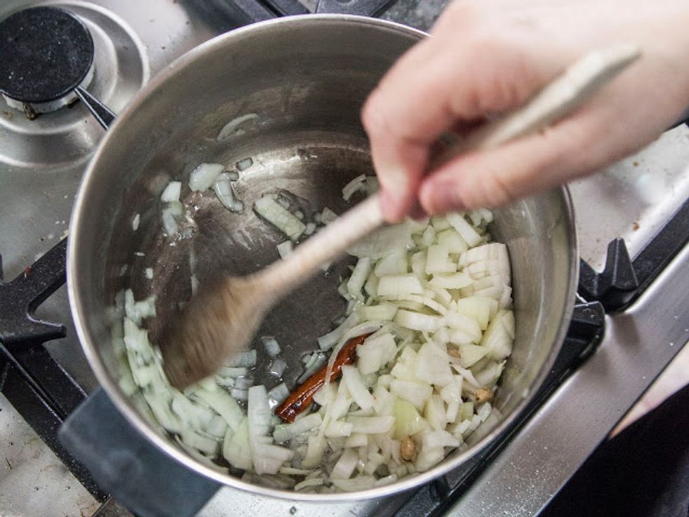 Let them sizzle for a couple of minutes. When they swell a bit and get aromatic add in the chopped onion.
