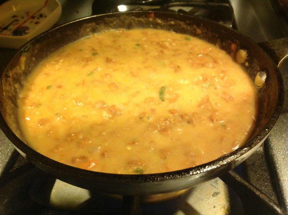 Let those simmer most of the water away, and then mash up with a potato masher. A little chunky is ok. Keep simmering until you have a thick soupy mixture. Add salt to taste. Set aside to cool a bit.