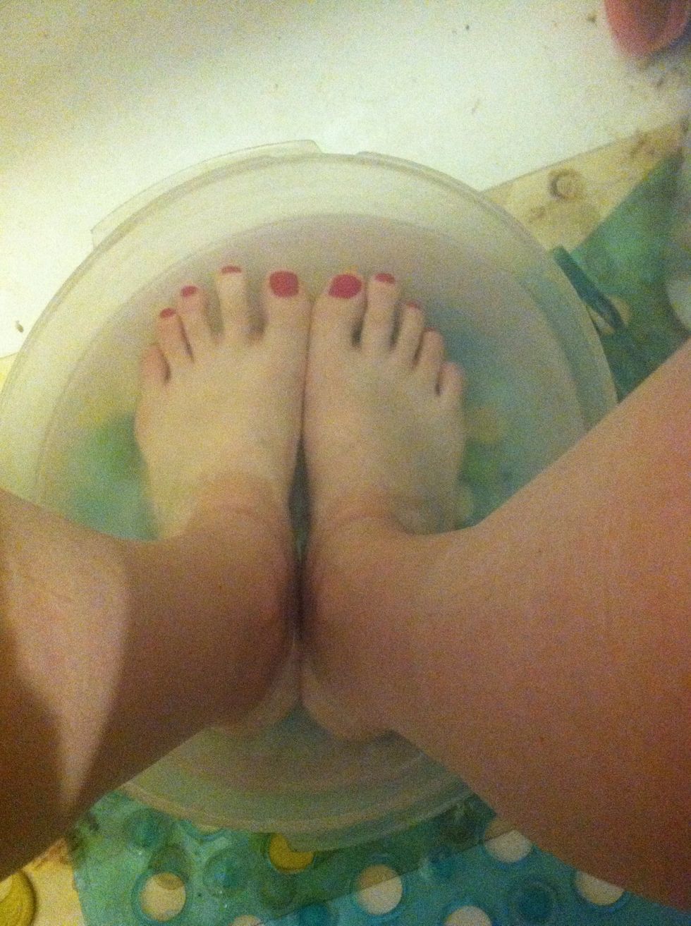 Let your feet soak in the warm water for a few minutes.