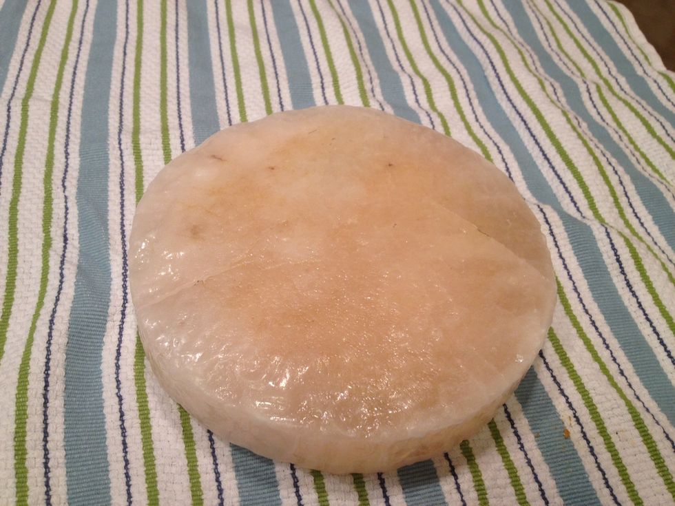 Let your salt block cool to room temp, then scrub gently with a brush or sponge and warm water. Do NOT use soap. Rinse. Dry well. Store in a place with low humidity- and get ready to use it again!