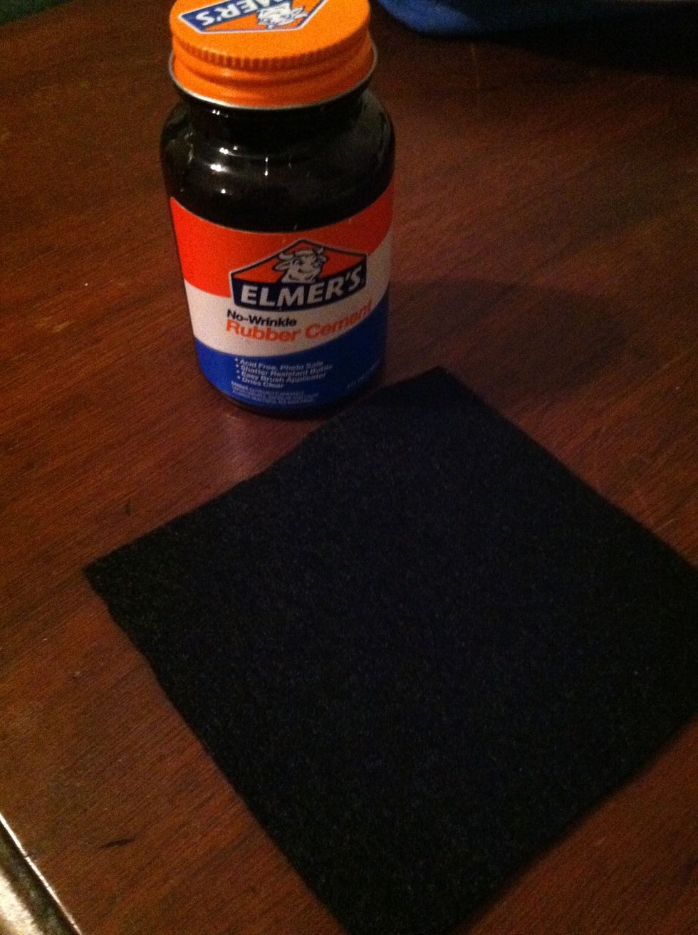 Let your tiles dry for at least 20 minutes. While they're drying, cut out six squares of felt. I like my felt squares to be almost as big as the tile. Use the tile as a guide when cutting the felt.