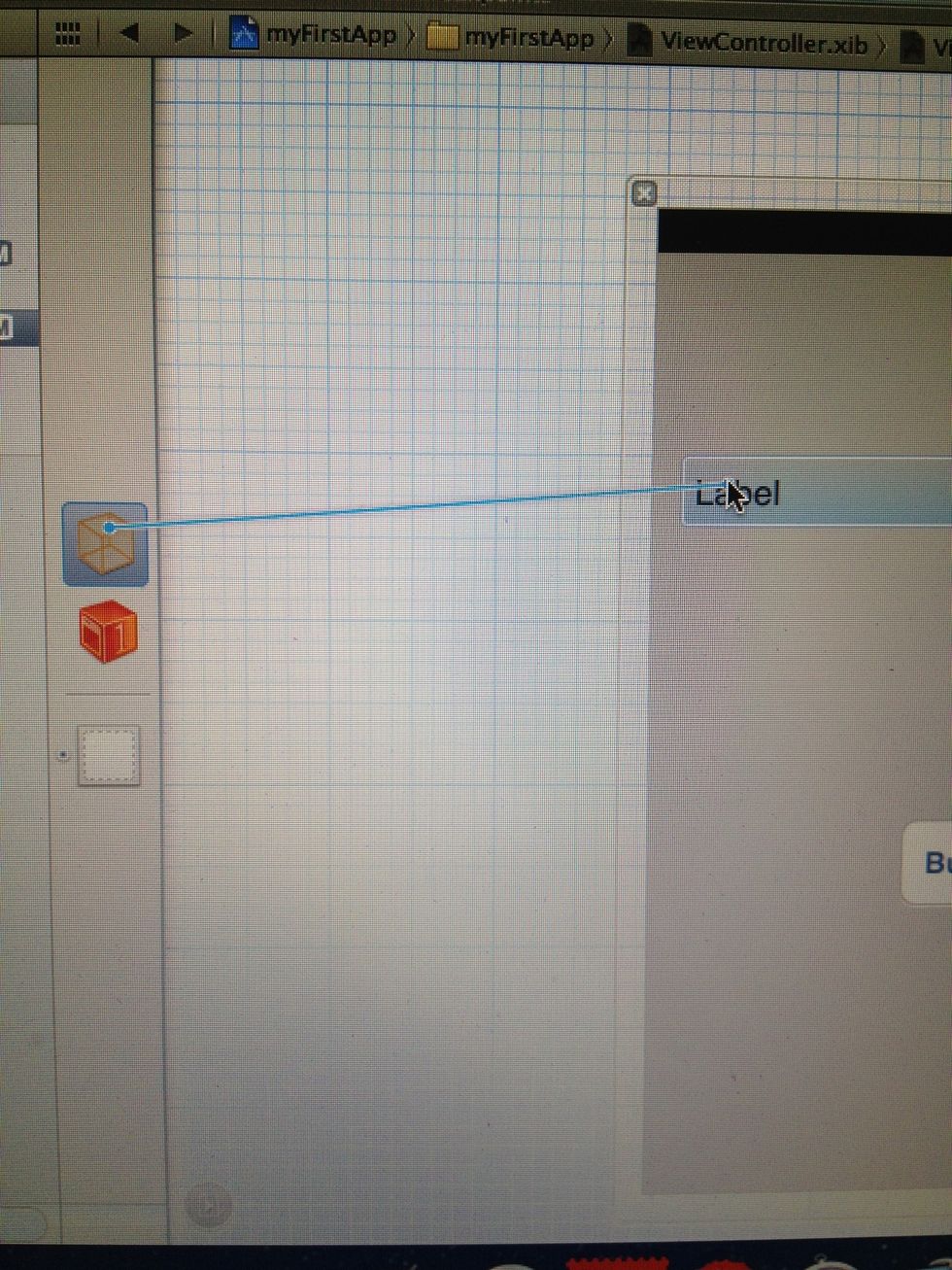 Lets connect the Label object with our Label on the Interface... For that, go to ViewController.xib, click once on the little box, hold "ctrl" key and the mouse button and drag a line to our lable