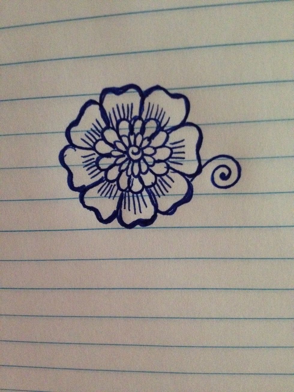 Lets expand the design by adding a swirl to the side. Remember to draw nice and slowly and keep your hand steady and relaxed to get the smoothest curves.