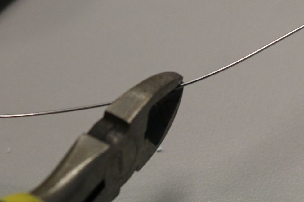 Lets get started - grab the steel wire. Cut a piece about 5" of the wire for one side of the armature (the structure that holds the copper coil).