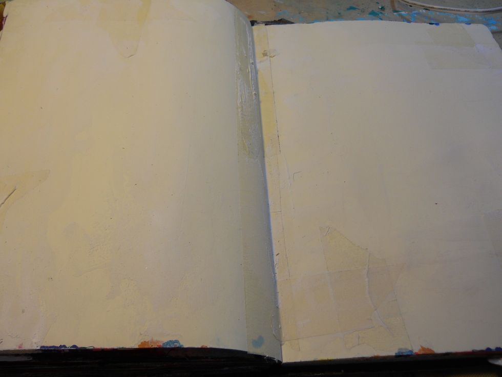 Lets get started! this first step is to prepare your surface. I was working in my art journal, so I applied masking tape to the seam, and to a few other places for unity.