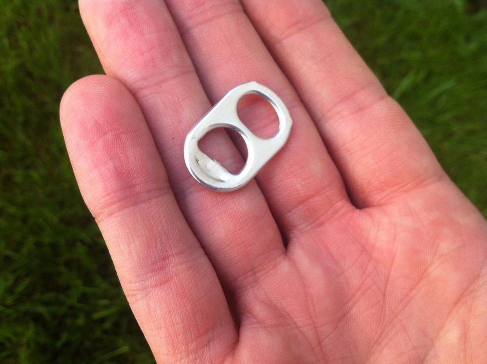 Lets make a hook out of the tab from a can. In the wild you'll have to improvise tools. But I'll use tools here just to show you the end results you're looking for.