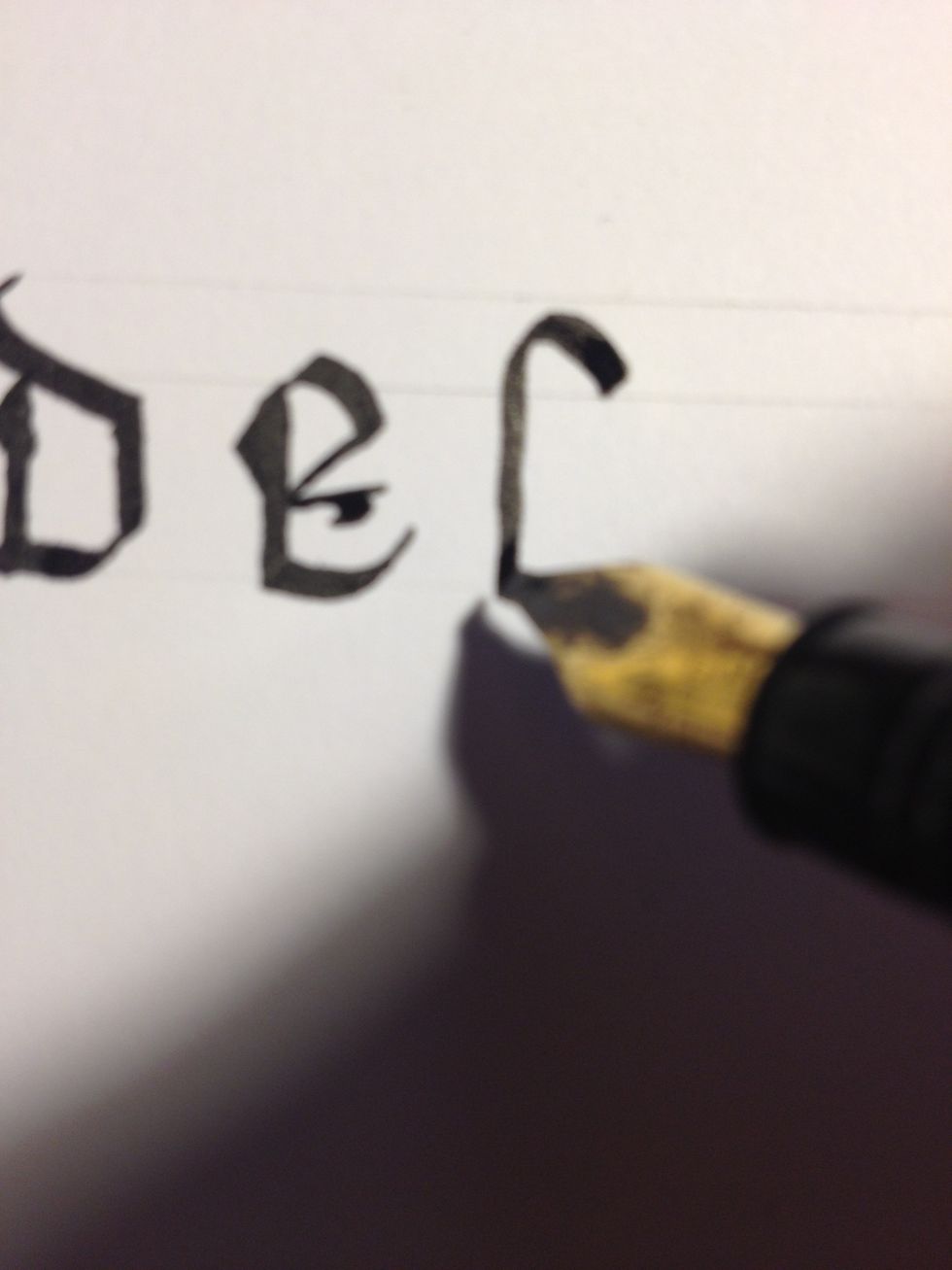 Letter "f" begins as a tall, plain trunk with a cane curve at the top. Note the curve's placement between the two top lines.