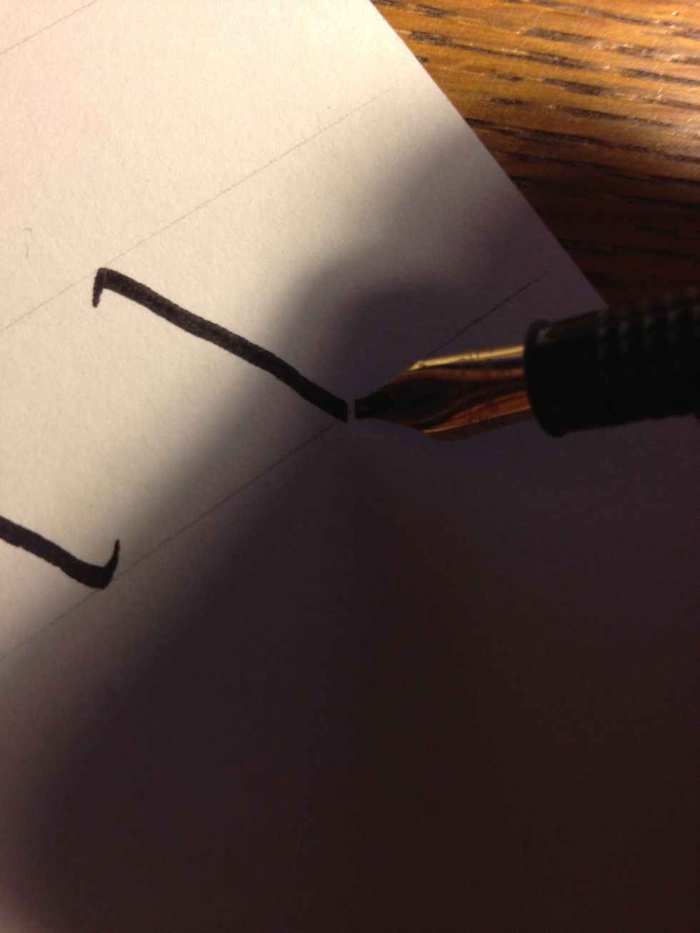 Letter "y" also begins with a diagonal, but with no tic at the bottom.