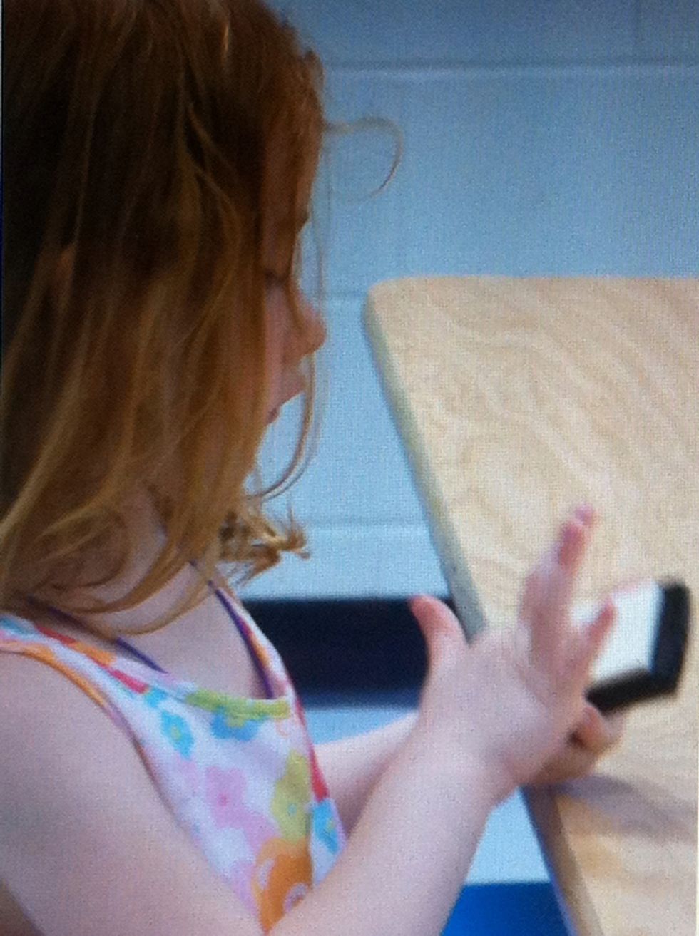 Liberally smush the hand that will be printed into the versamark pad. Make sure you coat the hand well!