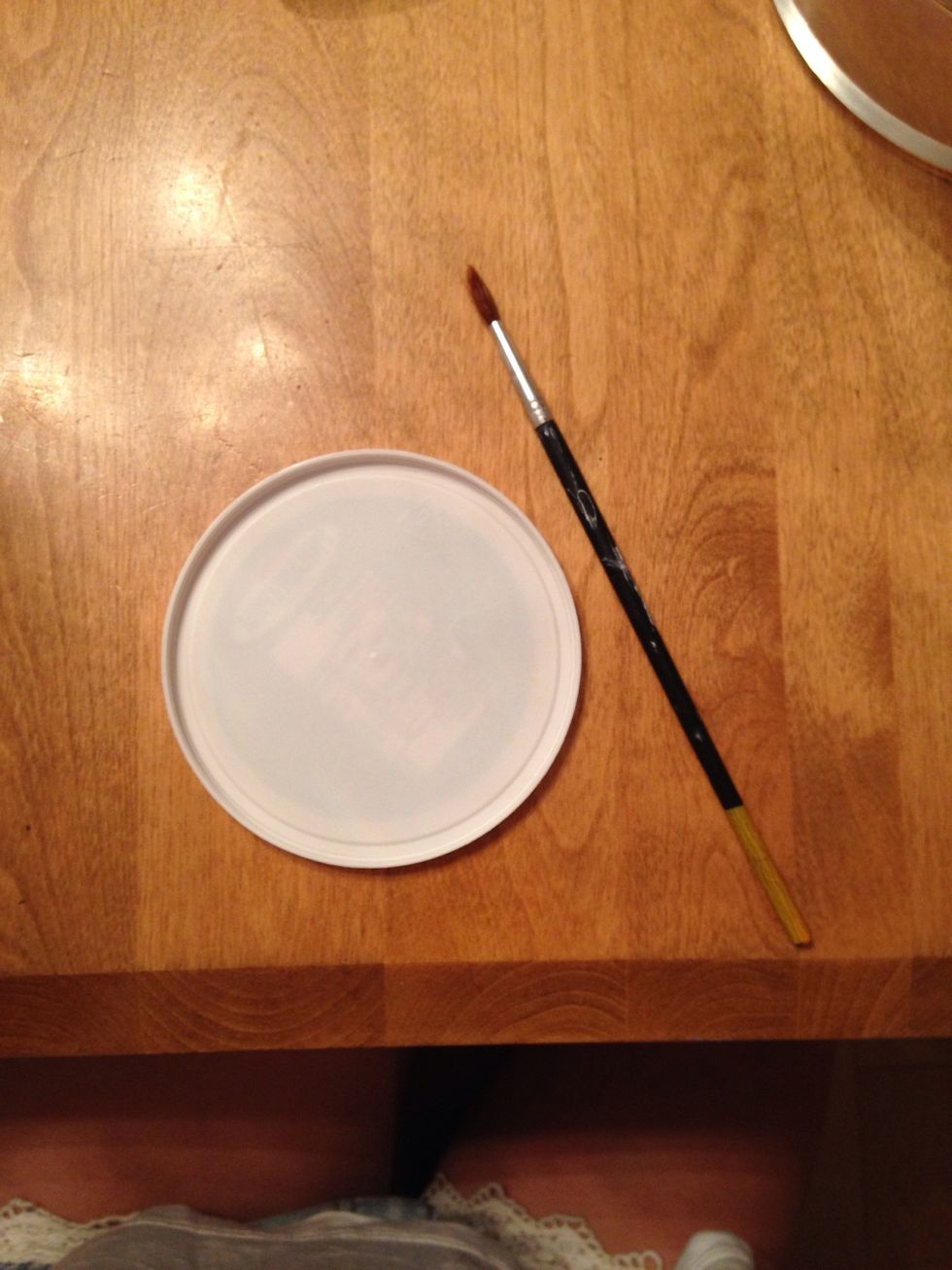 lid and paintbruah