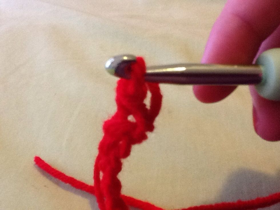 Lift middle and bottom loop over the wrapped yarn, do step 5-9 over and over again until you get to the end of the yarn