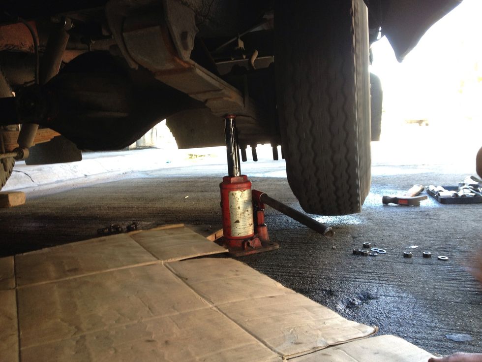 Lift the affected tire.