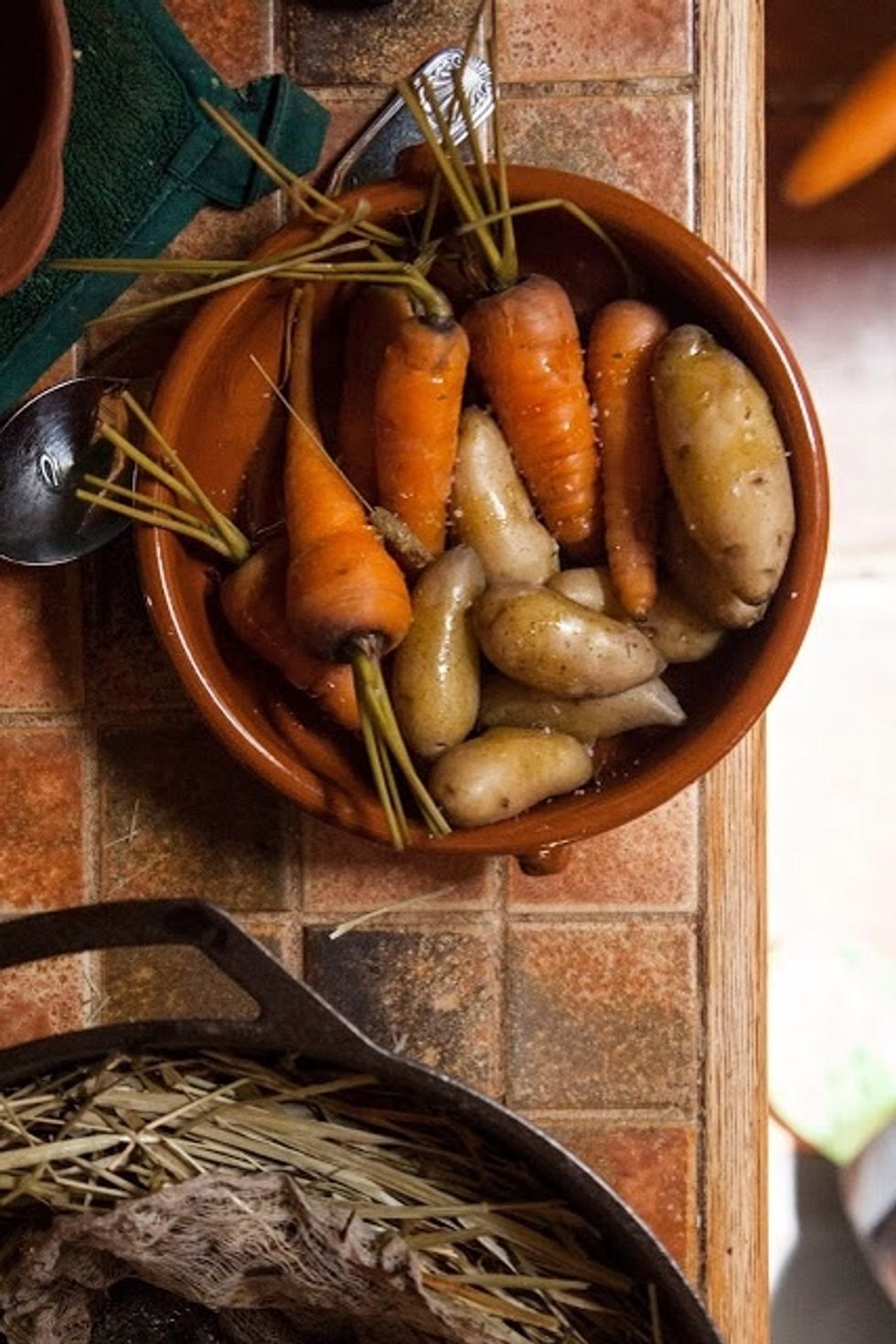 Lift the cheesecloth bundle out of the pot, and remove the vegetables. Season them with a bit of sea salt  if you wish.