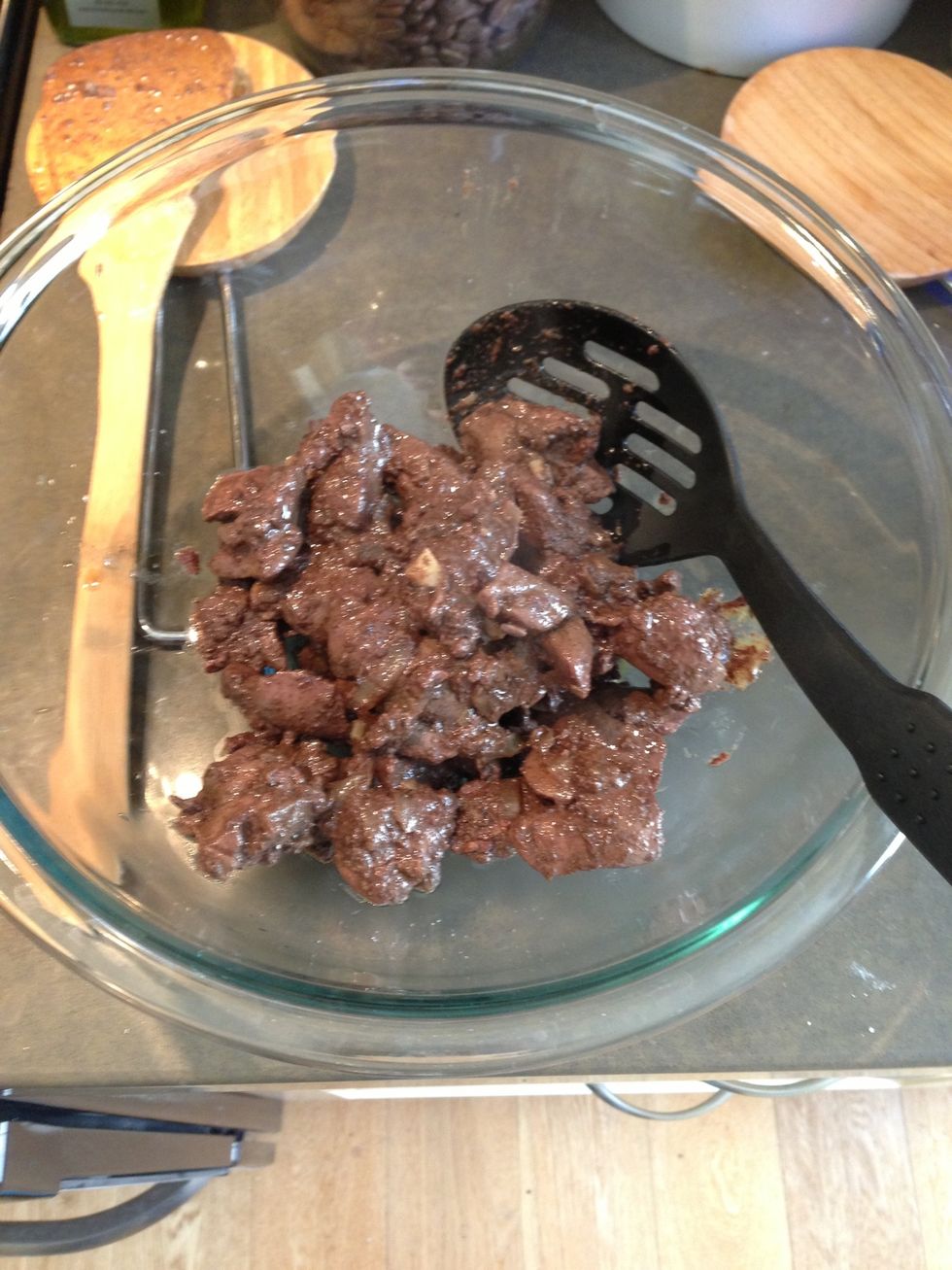 Lift the liver and shallots out into a bowl to cool. Then get your brandy into the pan and put your flame-retardant eyebrows on...