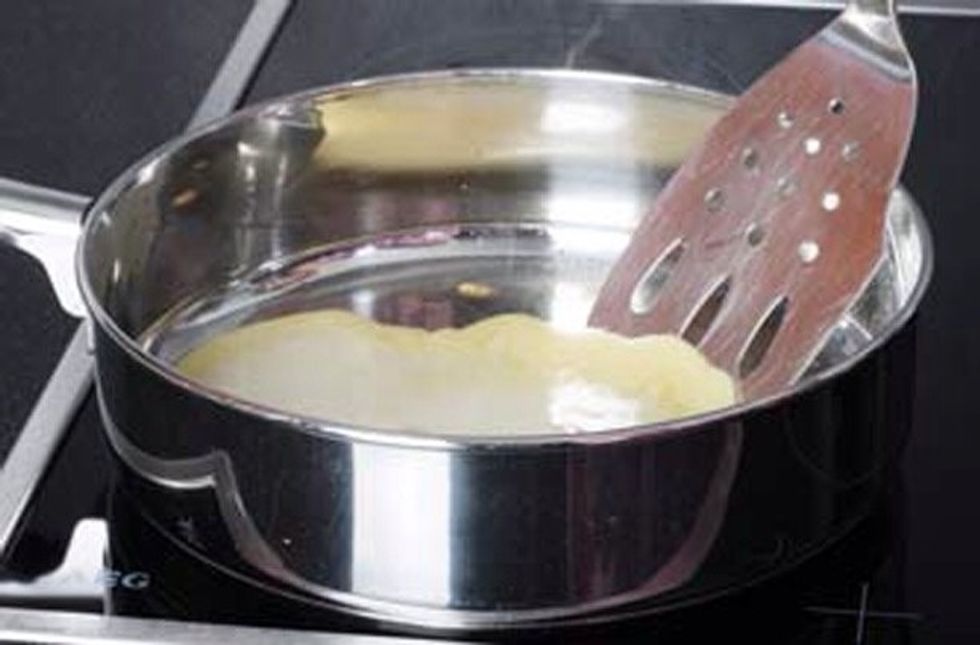 Lift the pancake up to see if its browning from underneath. Gently shake the pan until you can place it on the spatula