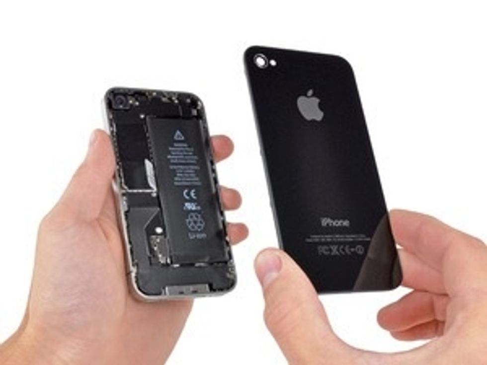 Lift the rear panel away from the iPhone.